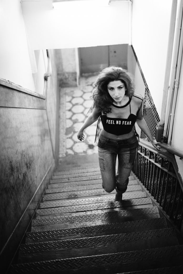 Gigi Rich ascends the stairs