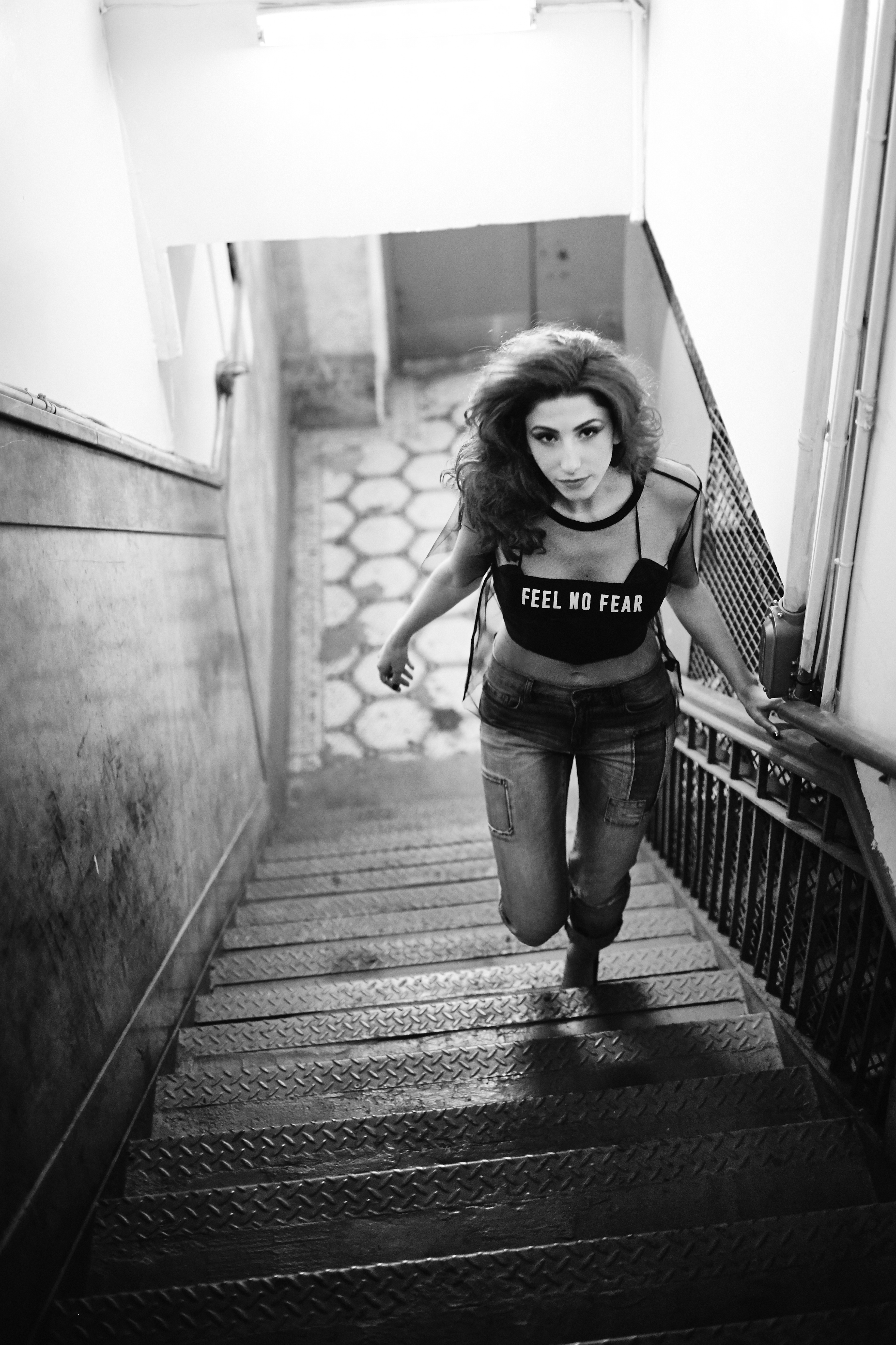 Gigi Rich ascends the stairs