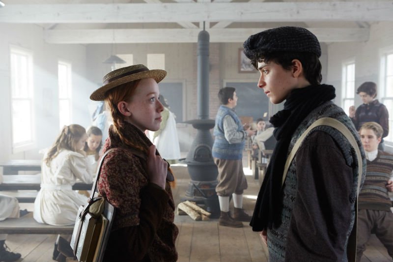 Anne Shirley (Amybeth McNulty) and Gilbert Blythe (Lucas Jade Zumann) at school.