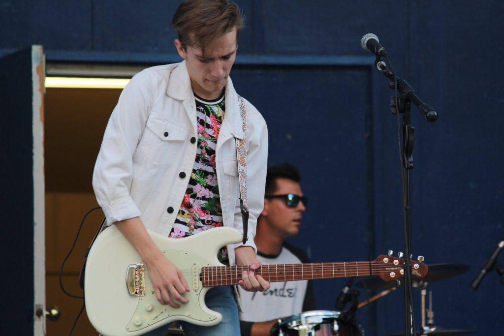 Beamer Wigley playing guitar in Osoyoos