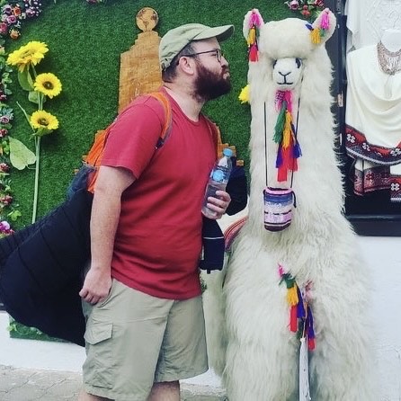 DJ nearly kisses a Llama